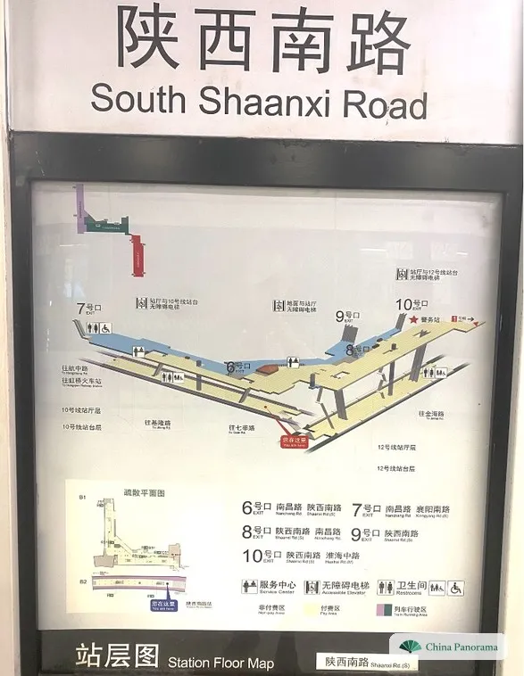 Station sign for 陕西南路 South Shaanxi Road in Shanghai, below it the station map with exits 6号口 to 10号口, lifts and toilets