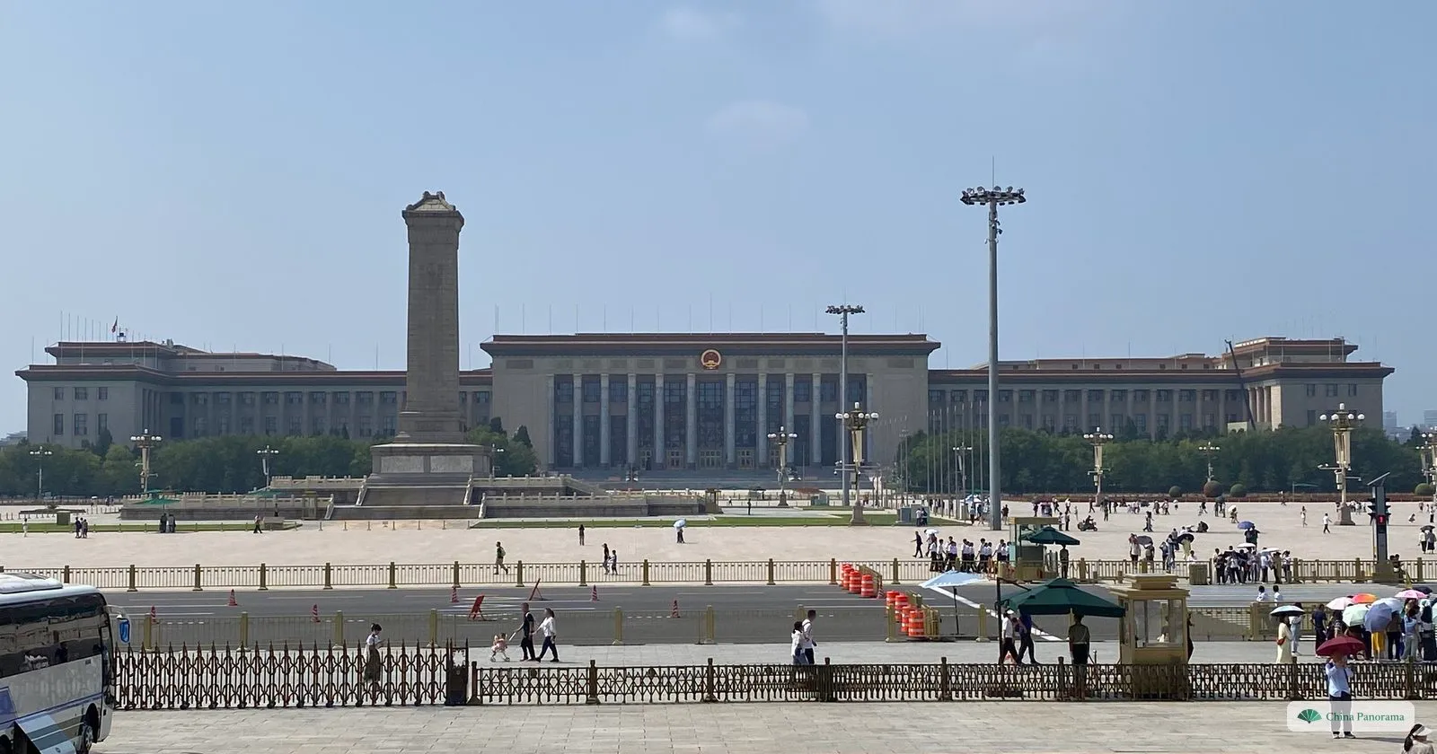 Tiananmen Square looking west: the granite Monument to the People’s Heroes in front of the long colonnade of the Great Hall of the People