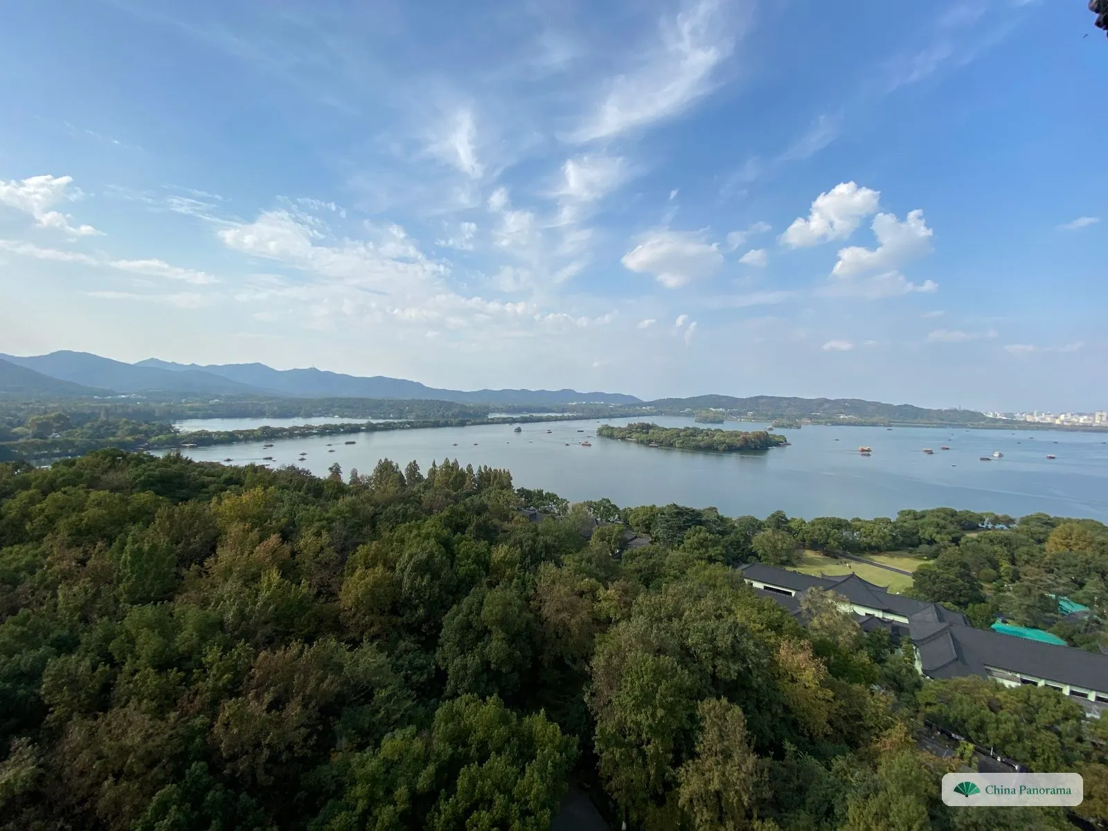 West Lake from the top of Leifeng Pagoda, an island in the middle and the Su Causeway on the left