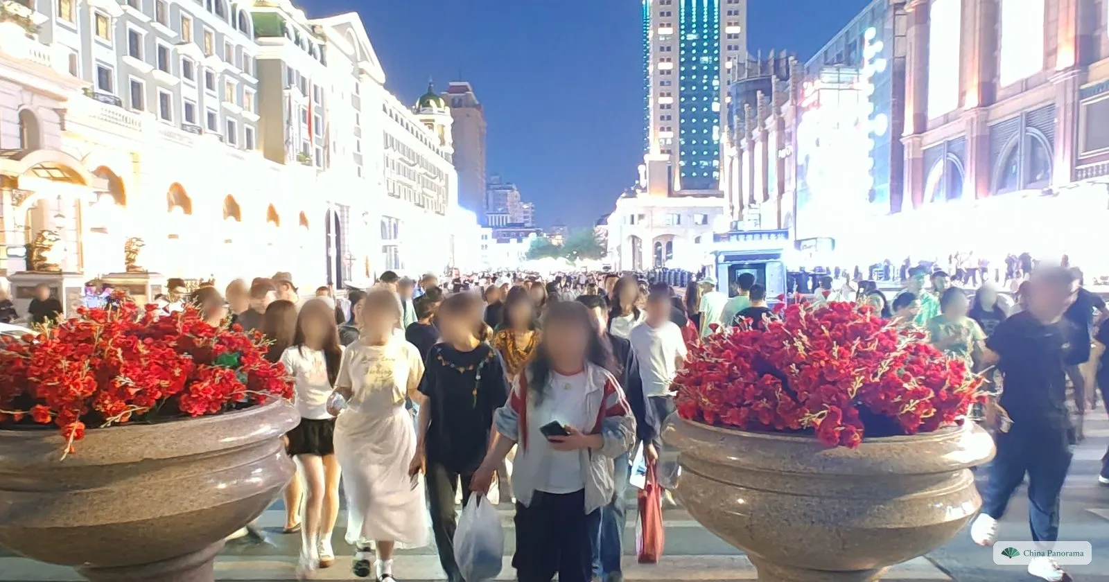 Granite setts and flower planters on the pedestrian section of Central Street in Harbin
