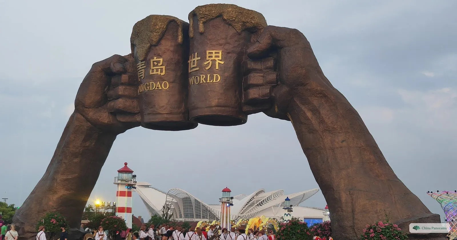 A giant sculpture of two hands clinking beer mugs at the Qingdao International Beer Festival site at Golden Beach