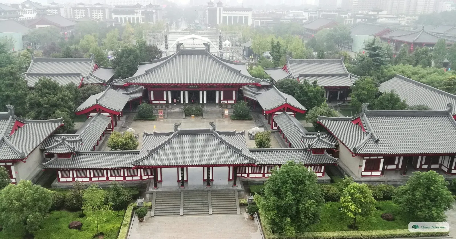 Grey-roofed temple halls with red columns around a courtyard, seen from above from the Giant Wild Goose Pagoda